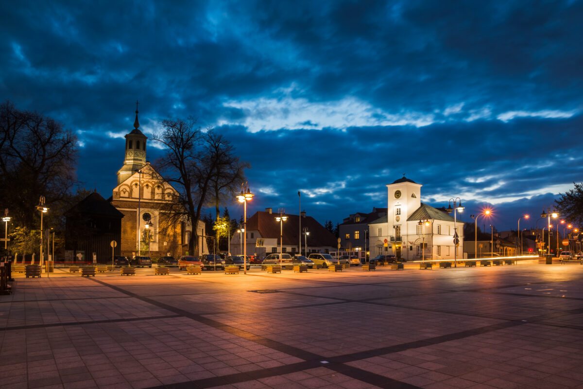 Main market at night in Piaseczno city, Poland